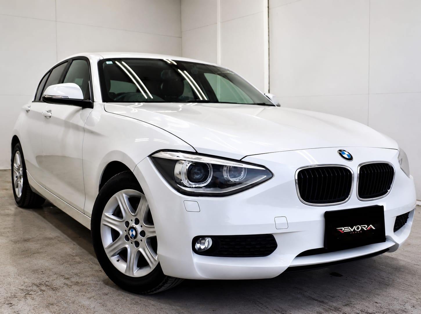 2015 BMW 1 Series 116i, front three-quarter view